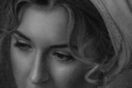 Hyperrealistic graphite portrait drawn using a single 8B Black penc